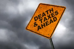 street sign saying "death & taxes ahead"